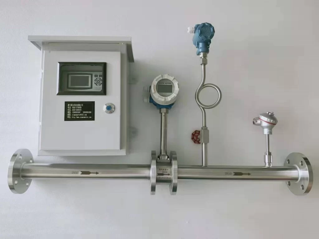 Steam flow meter with temperature and pressure compensation